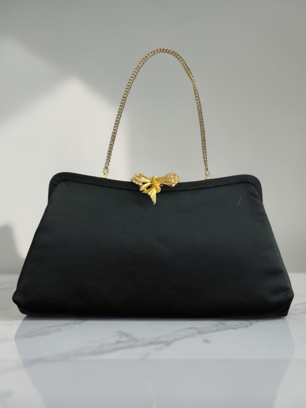 Black Handbag with Gold Accents
